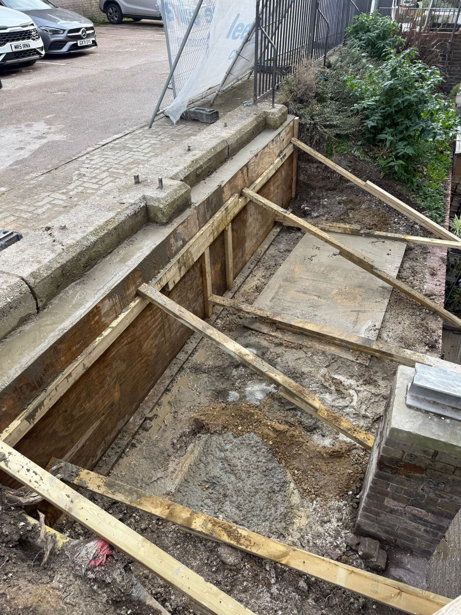 Underpinning and foundation groundwork with structural excavation in place
