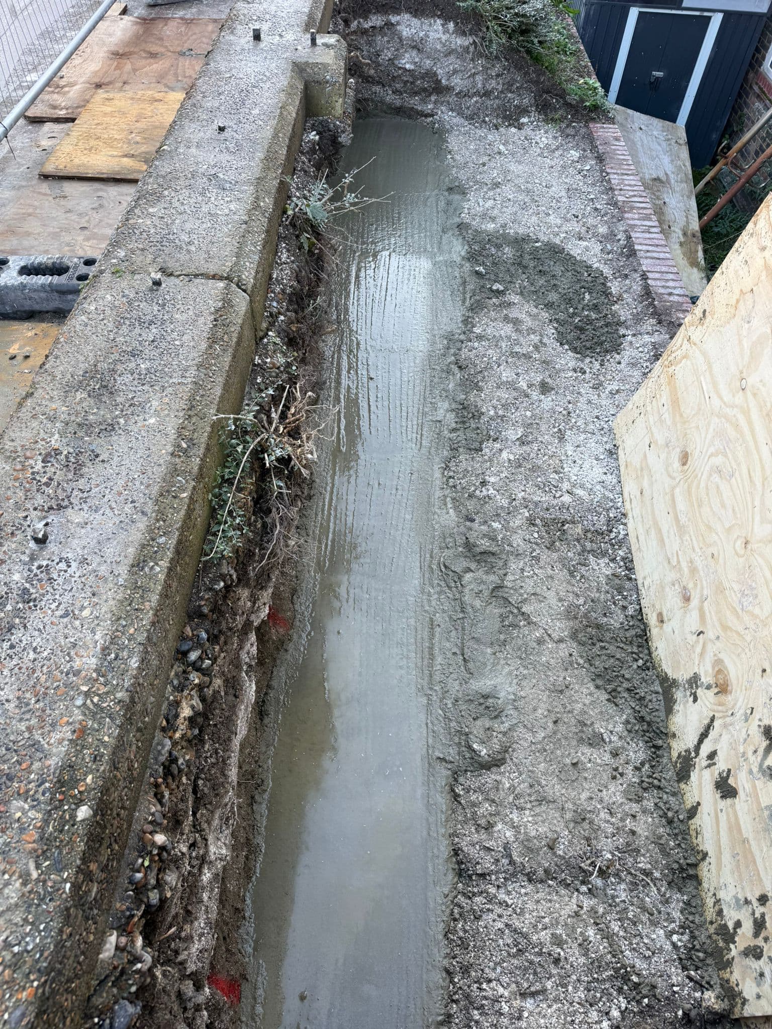 Foundation trench excavation and ground preparation on site in Sussex